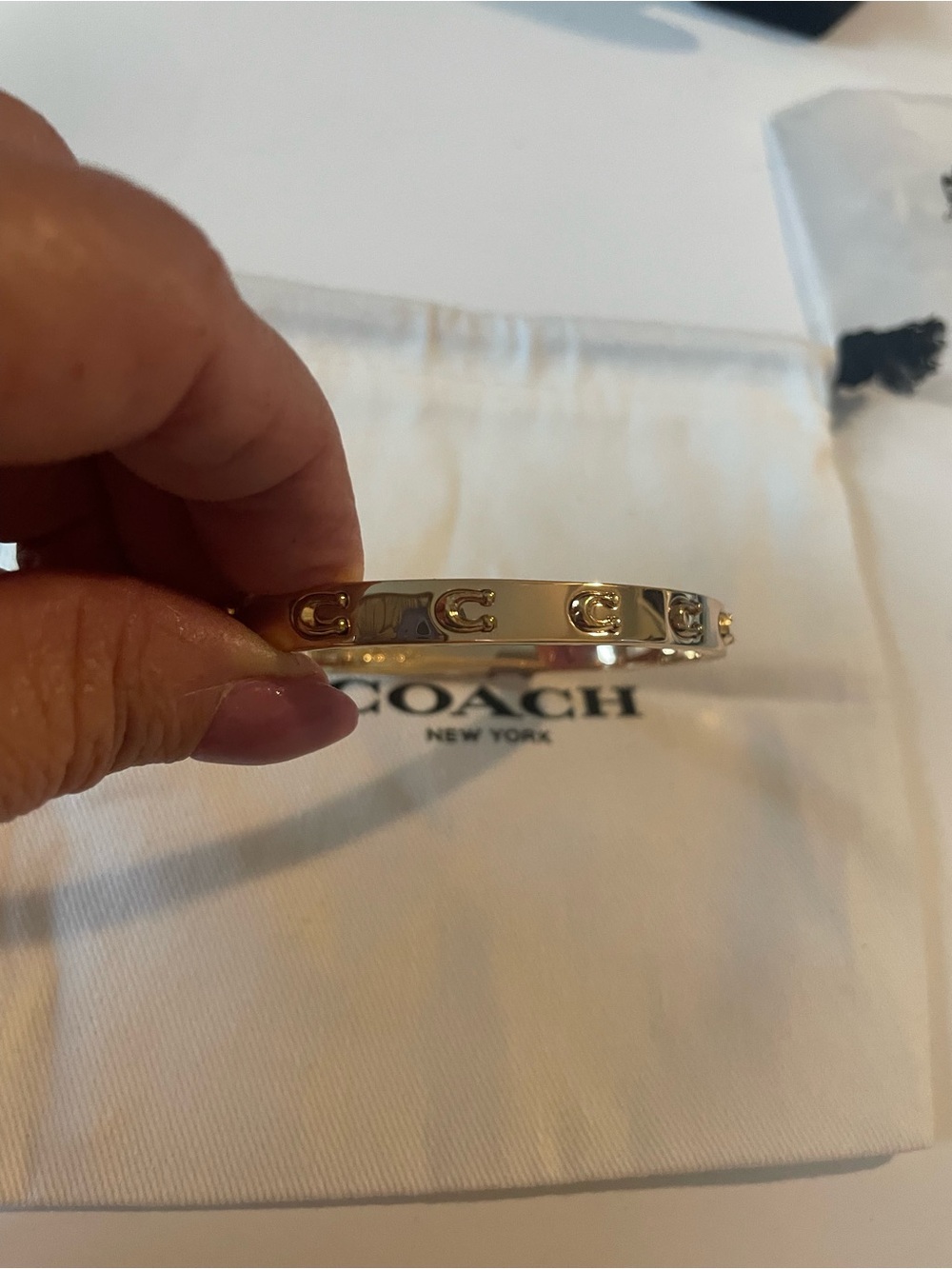 Coach Gold-Tone Rivet Bangle Bracelet - Picture 3 of 4